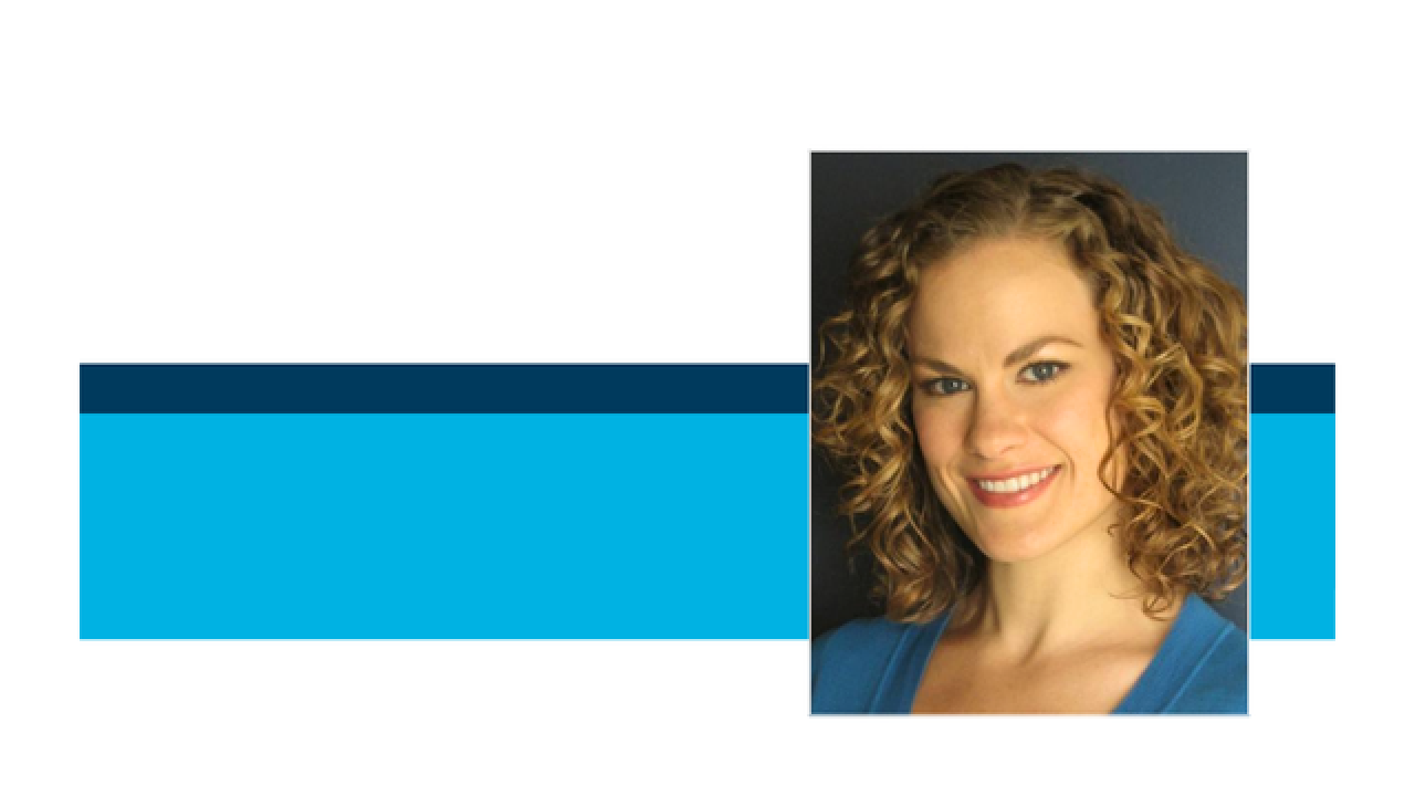 Portrait photo of smiling curly-haired woman over cyan and navy graphic bars