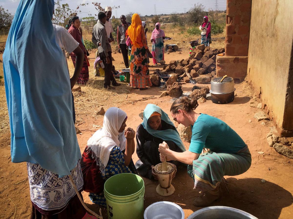 Carrie Waterman helps harvest moringa. (Photo courtesy of Carrie Waterman)