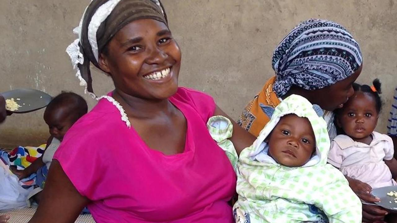 Study finds early interventions that promote caregiving and learning are more effective than nutrition in promoting brain development. (Elizabeth Prado/UC Davis) Woman and child in Malawi