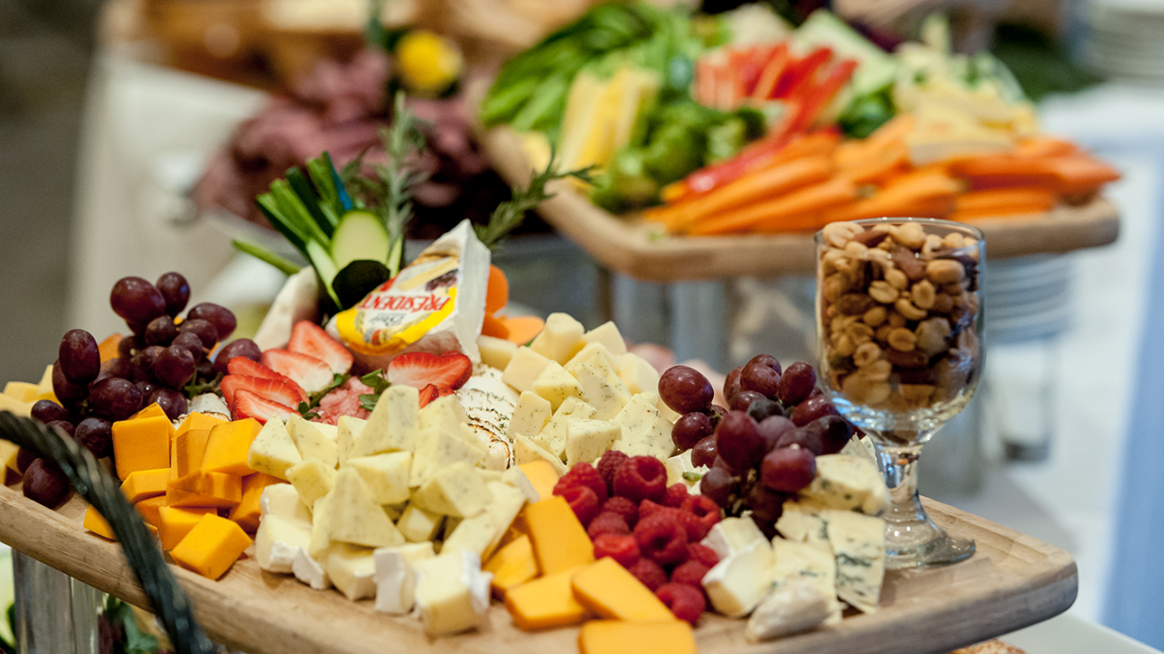 Platter of fruit, cheese and nuts